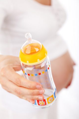 mother-with-a-feeding-bottle